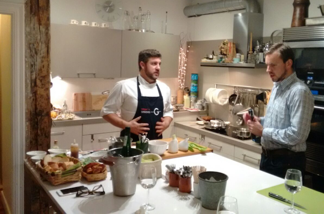 Chatting to chef Íñigo in the kitchen of our pintxos cooking class in San Sebastian - Tenedor Tours