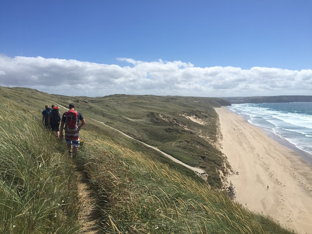 Hiking the South West Coast Path next to Perranporth beach and Perran Sands, Cornwall