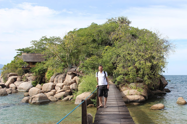 Simon Heyes standing on the bridge to the chalets - Mumbo Island